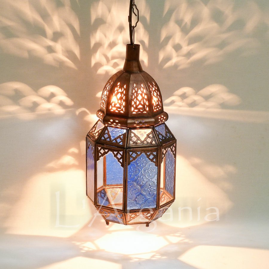Amina Blue lantern with blue glass panels and handmade Moroccan metal frame for patio decor.