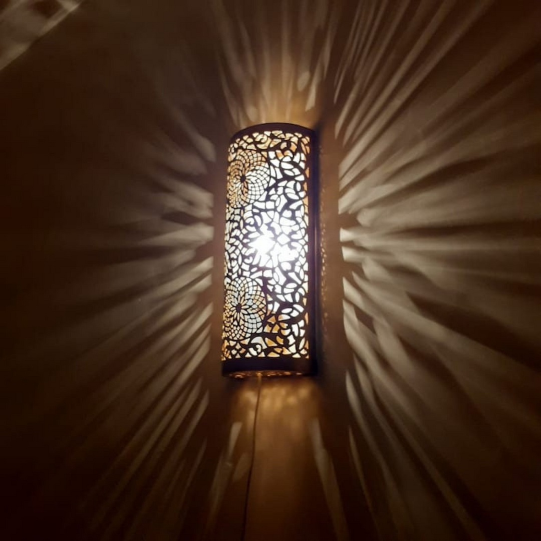 Brass Wall Sconce Bakir showing Moroccan brass texture and soft illumination for entryways, lounges, and decorative walls