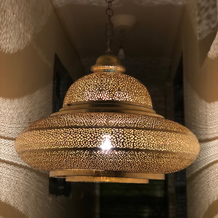 Brass Ceiling Light Lubna with rounded brass glow and handmade Moroccan detail for bedrooms, hallways, and lounges