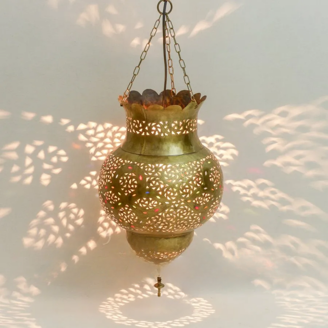 Brass Ceiling Light Youssef with disk shaped glow and handmade Moroccan detail for bedrooms, corridors, and lounges