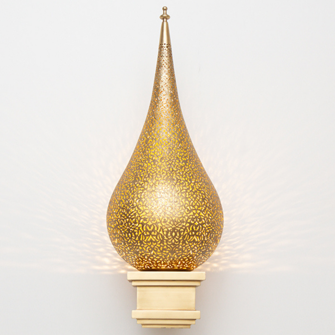 Brass Wall Sconce Hatem with warm brass shine and handcrafted detail for bedrooms, hallways, and cozy interior walls
