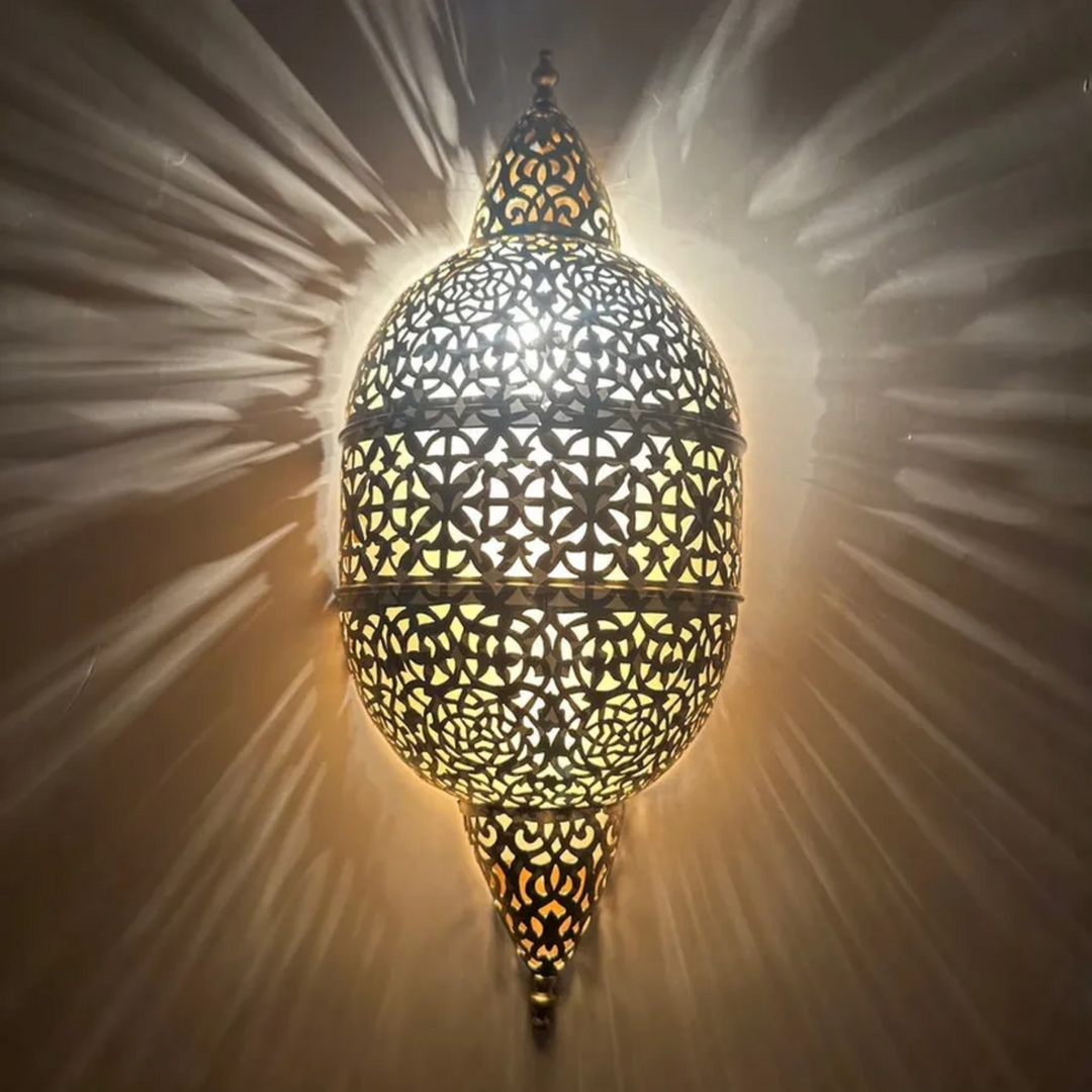Brass Wall Sconce Rabia giving a soft golden glow with handmade brass detail for bedrooms, hallways, and cozy interior walls
