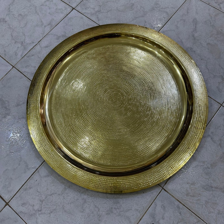 Moroccan Hand Engraved Tray Hamsa top view showing symmetrical shape, engraved motifs, and bright brass texture