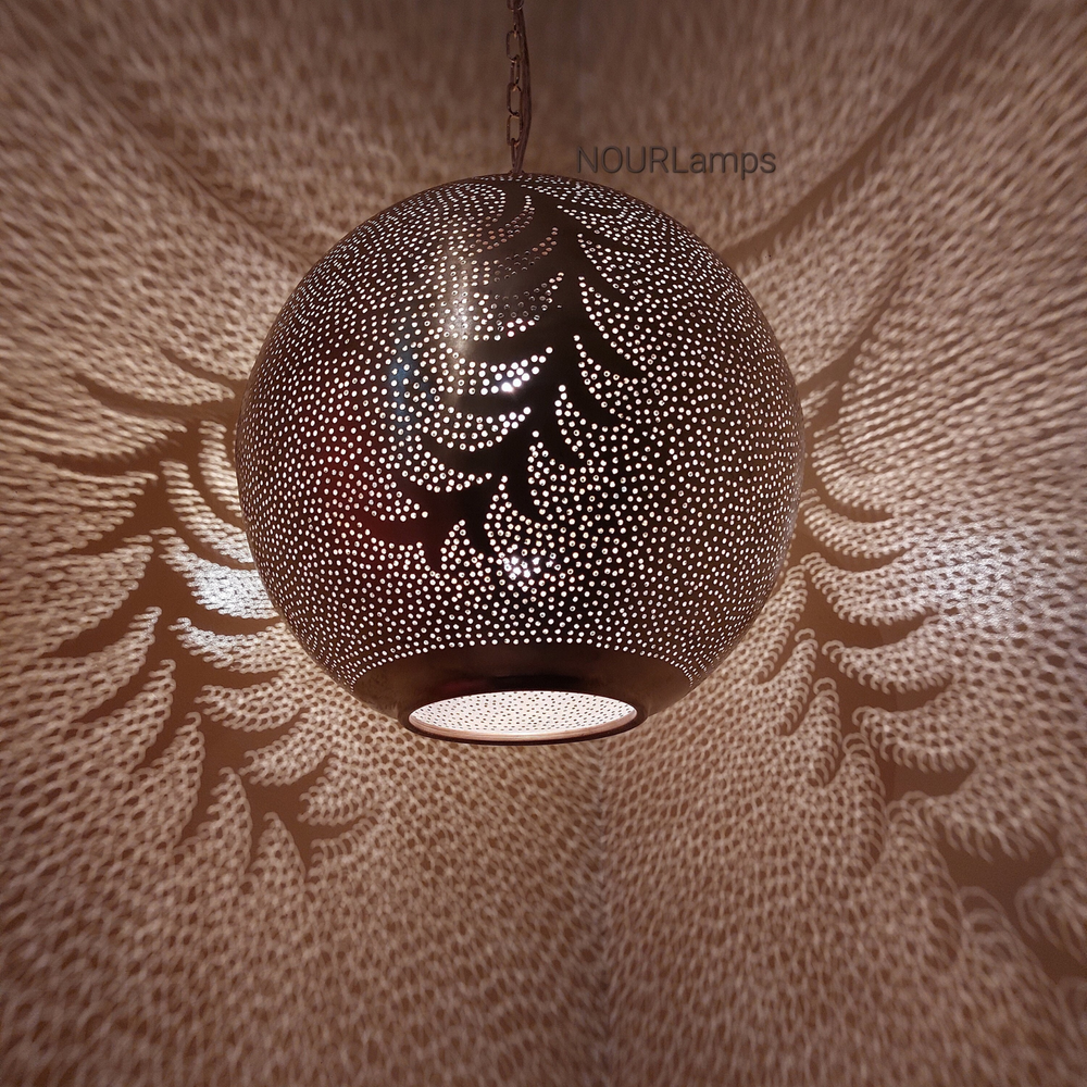 Fatih brass pendant shade with Moroccan detail creating soft ceiling illumination for riads, corridors, and welcoming entries.