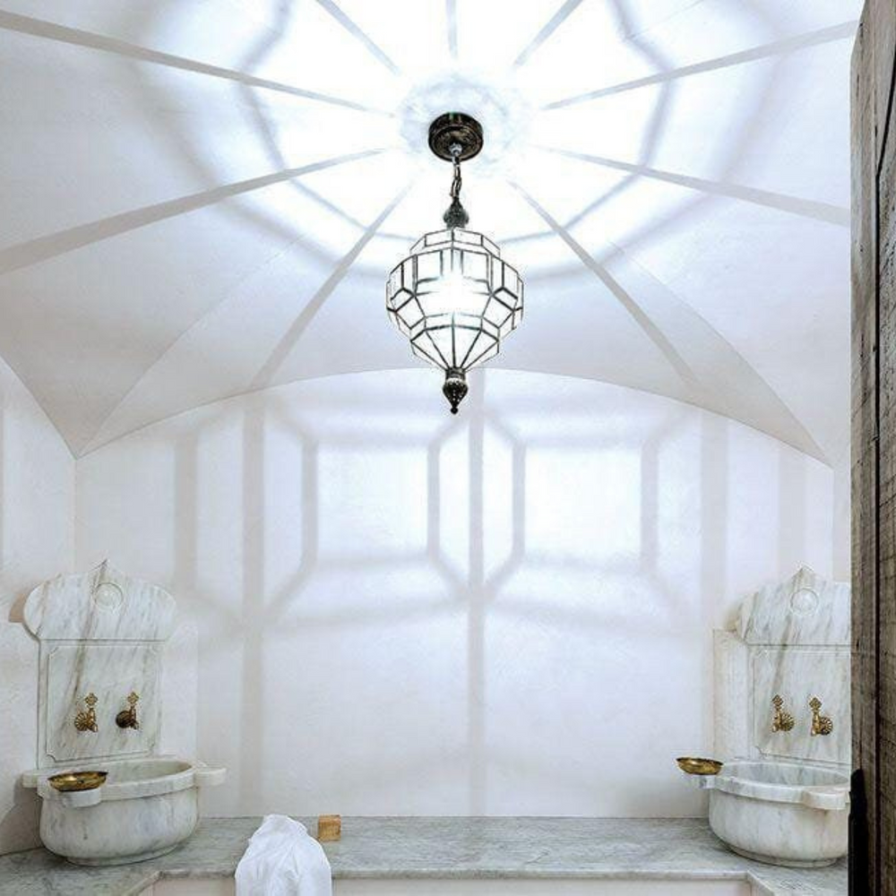 Geometric Glass Lamps Miloud Transparent showing clear glass panels with angular form for refined interior lighting