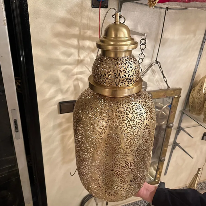 Jamila Moroccan hanging lamp in polished brass finish with soft patterned lighting for riads, hallways, and elegant home decor.