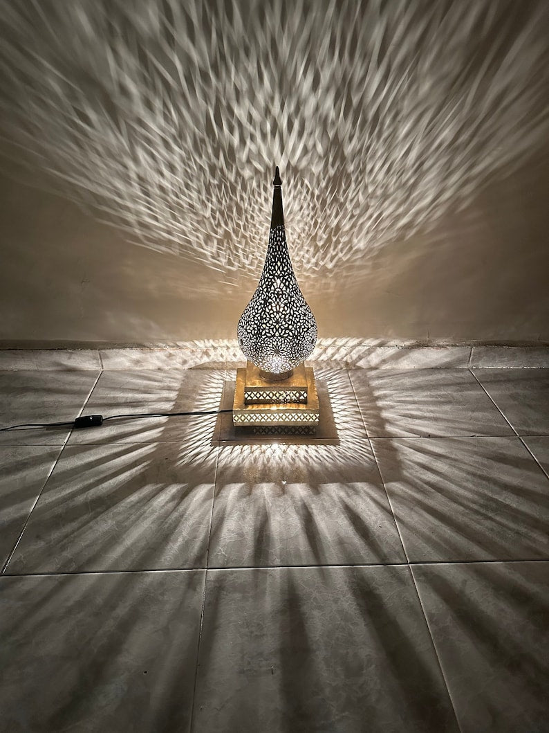 Front view of Jawahir lamp showing refined Moroccan form for riads and boutique hotel rooms.