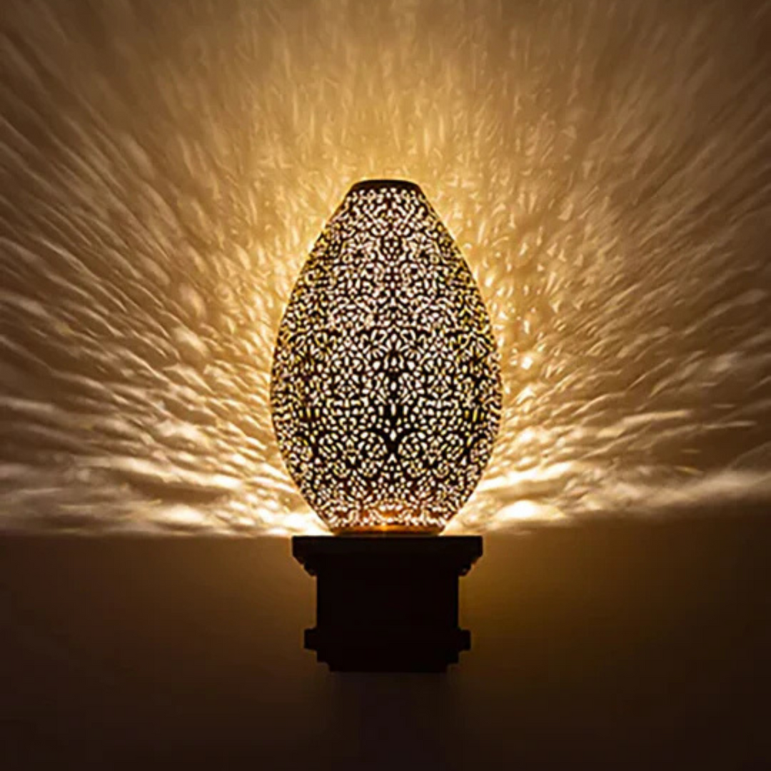 Layth brass wall sconce with gold Moroccan form for hallway lighting.