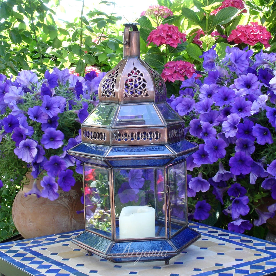 Moroccan Lanterns Fatima Sea styled for an entryway with blue glow and Moroccan decorative appeal
