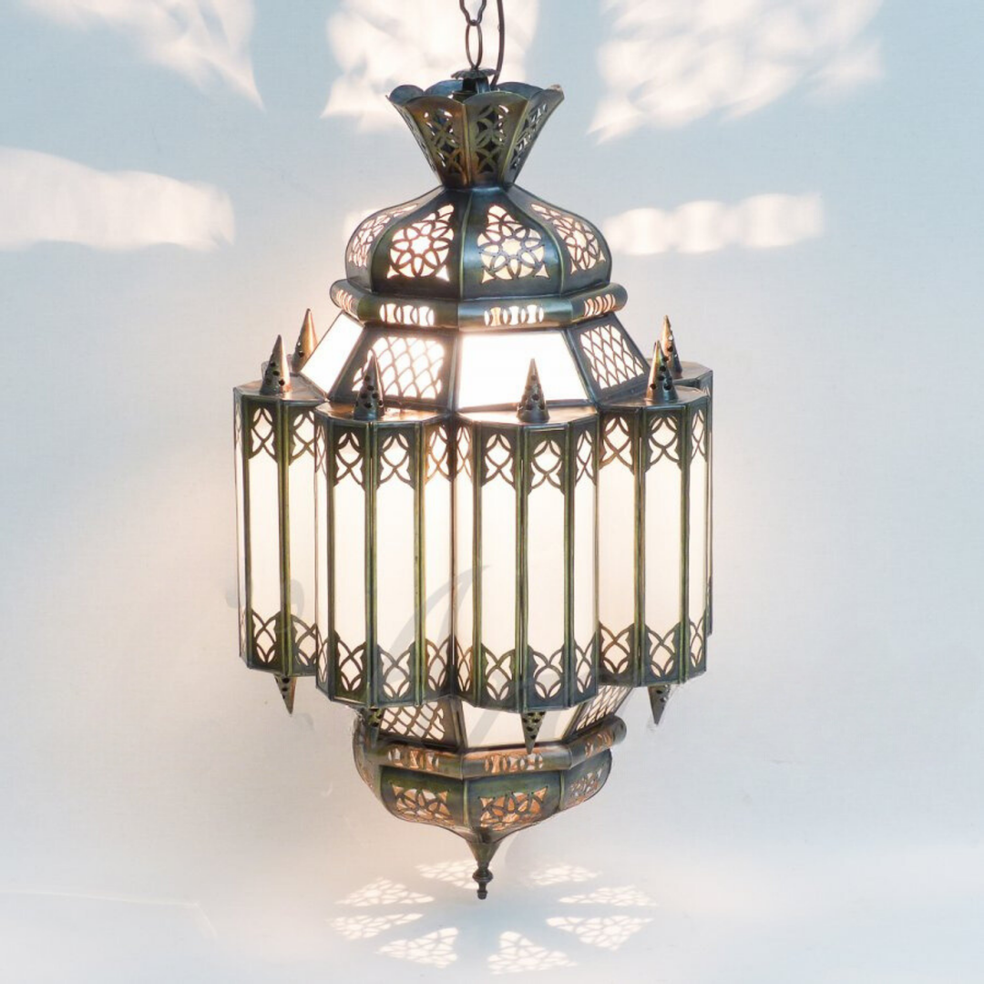Moroccan Lanterns Awal Snow with frosted glass glow and handmade metal detail for patios, entries, and lounges