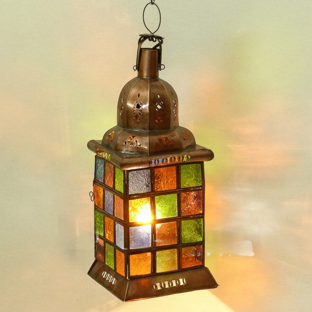 Moroccan Lanterns Dama with warm ambient glow and handcrafted metal detail for patios, entries, and lounges