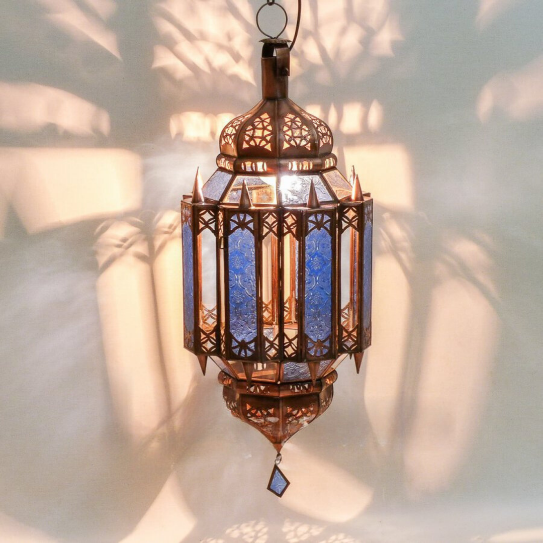 Moroccan Lanterns Tamen Sea with blue glass glow and handcrafted metal detail for patios, entries, and lounges