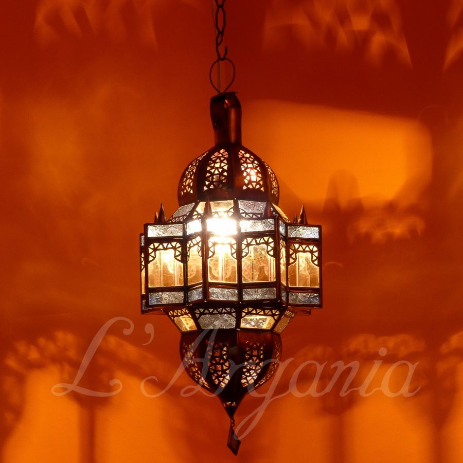 Mqenta Sky Moroccan lantern creating soft blue accent light for terraces, balconies, and garden lounges.