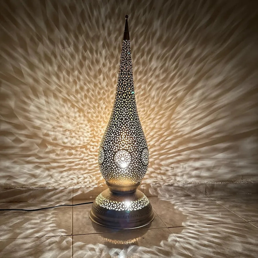 Nassim Moroccan floor lamp with handmade pattern body for warm standing light in living spaces.