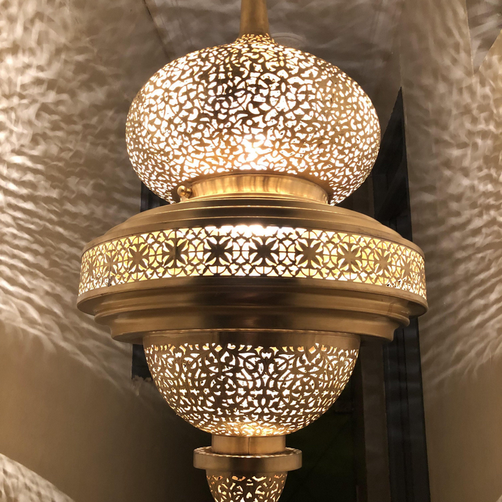 Brass Ceiling Light Rakia with carved metalwork, adding elegant ceiling decor to bedrooms, halls, and sitting rooms.