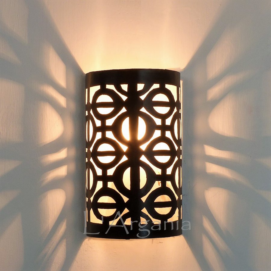 Raneem iron wall sconce with handmade Moroccan metalwork for warm decorative wall lighting.