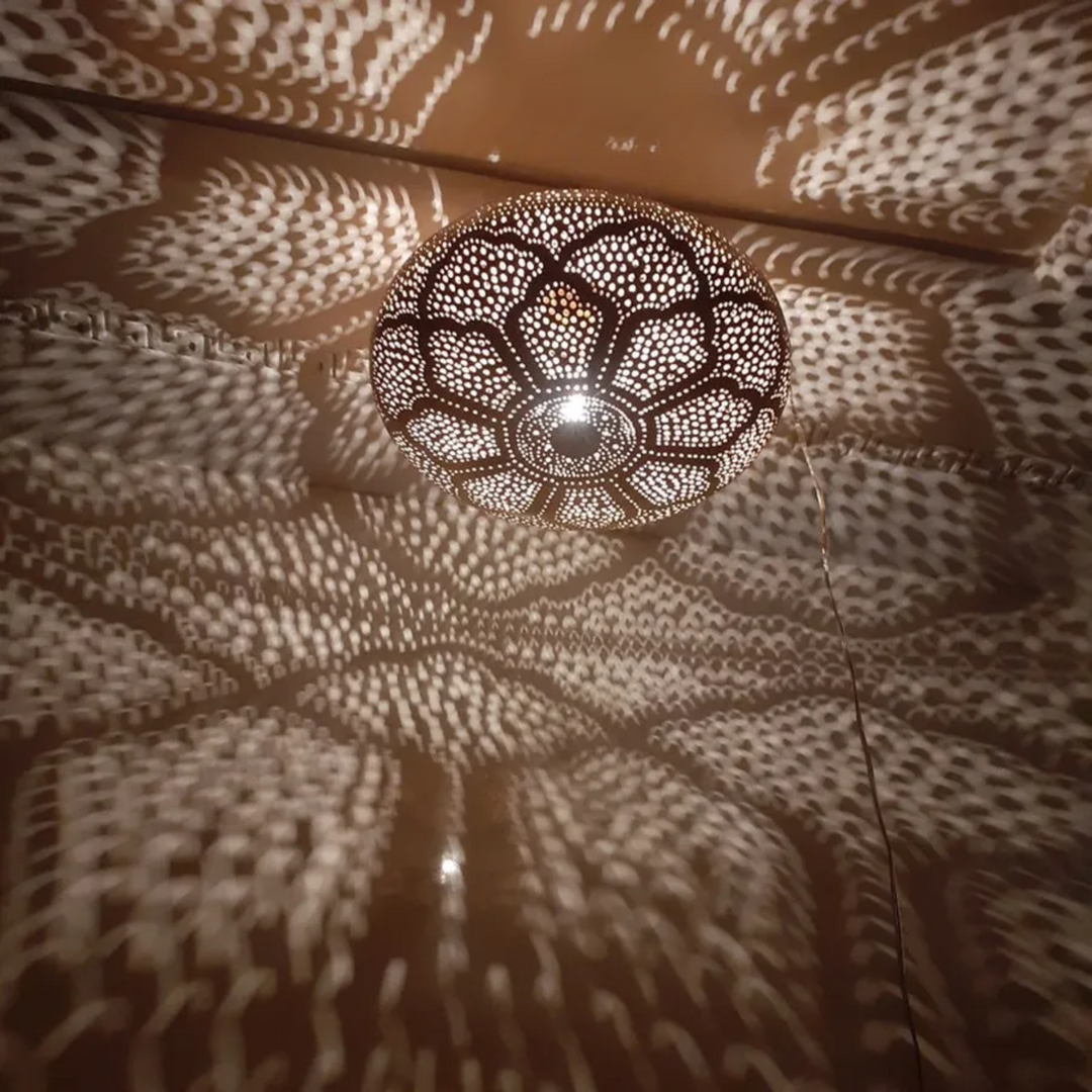 Zainab gold brass hanging fixture with elegant surface detail for warm hallway lighting and traditional Moroccan decor.