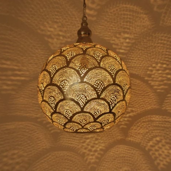 Zayne hanging brass fixture with polished metal character adding golden ambience to bedrooms, halls, and refined interiors.
