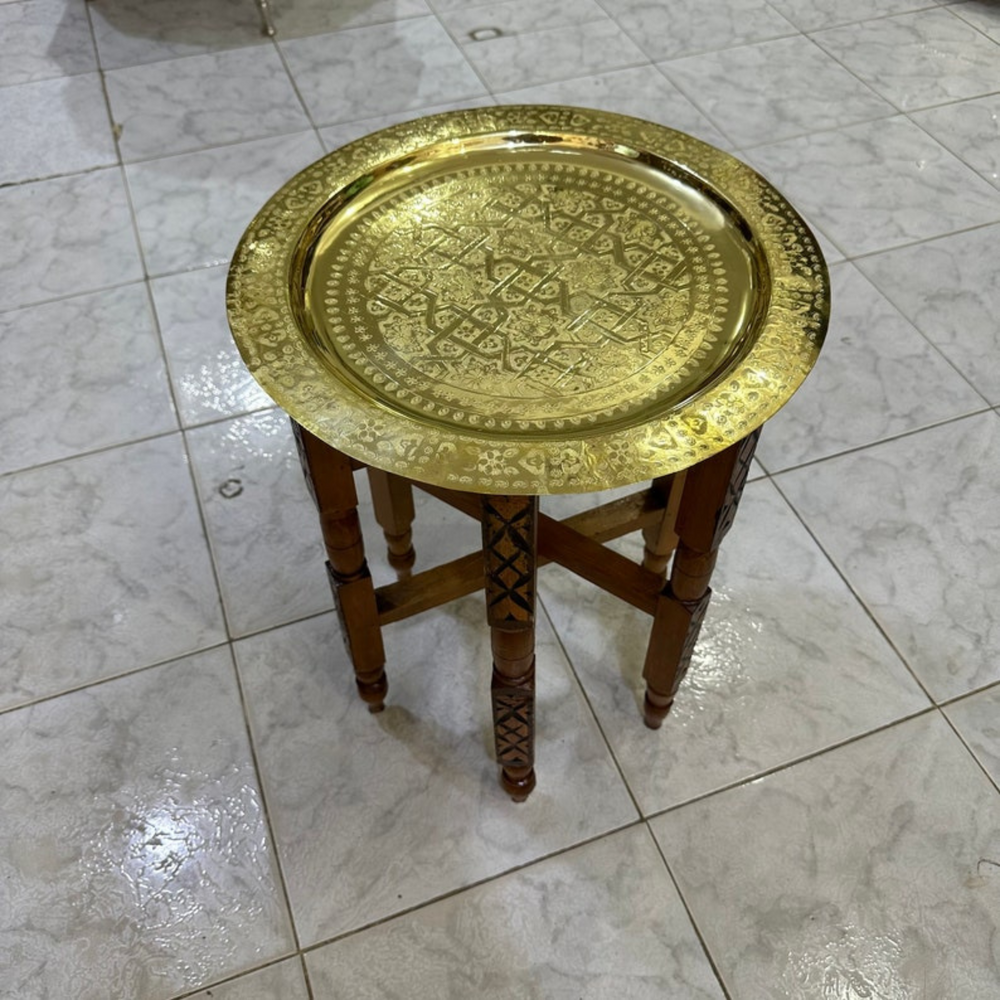Moroccan Hand Engraved Tray Zwina styled on a table with handcrafted brass surface and traditional Moroccan pattern
