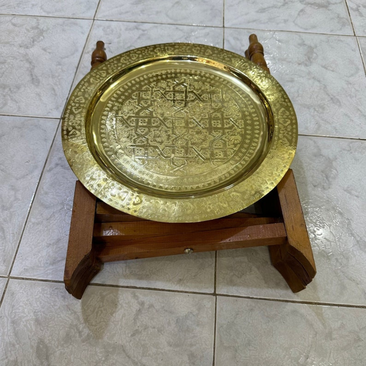 Moroccan Hand Engraved Tray Zwina with golden brass tone, ornate surface work, and elegant decorative appeal